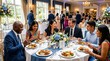 © mashimara - Diverse group of people enjoying a celebratory meal at a formal event