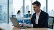 © Ohida - Dedicated manager using intelligent task management software for office workflow.