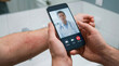 © Viskia - Microscopic dermal inflammation is evaluated via a tele-health video interface during a remote medical diagnostic session on a handheld mobile device.