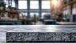 © farisky - Close-up of a textured granite countertop in a workshop setting.