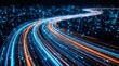 © Sukon - Dynamic curved road made of abstract light trails representing data flow and high speed.