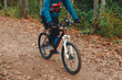 © Anton Pentegov - cyclist rides along trail in autumn park