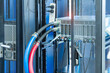 © xiaoliangge - server racks with a liquid cooled supercomputer system with tube