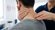 © Armando Loho - Professional therapist massaging man's neck for pain relief in a clinic environment