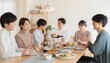 © 太郎 - ホームパーティーで楽しく食事をする若い男女（シェアハウス）