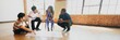 © Rawpixel.com - Diverse group of people discussing a project on the floor in a bright room.