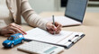 © Father_Studio - Insurance agent completing car insurance application form with calculator and vehicle model, highlight auto coverage, policy enrollment, premium calculation, financial protection, and claims planning.