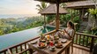 © Yanwar - Woman Enjoying Tropical Breakfast on Private Balcony Overlooking Lush Jungle Infinity Pool at Luxury Villa Resort