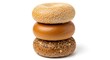 © Mst - A stack of three fresh baked bagels with sesame seeds and plain crusts