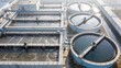 © JohnLee - Aerial perspective of municipal wastewater treatment facility with purification systems