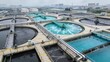 © JohnLee - Drone view of wastewater treatment plant showing modern water cleaning infrastructure