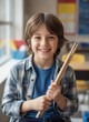 © KIMOG - Smiling pupil standing in school corridor with backpack ready for learning