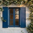 © KIMOG - Old Window with Open Blue Wooden Shutters on Rustic European House Facade