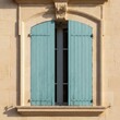 © KIMOG - Old Window with Open Blue Wooden Shutters on Rustic European House Facade