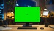 © FarrasHakimBagaskara - Desktop Computer Monitor with Green Screen on Desk in Night Home Office Mockup