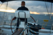 © Nazareno - Winch with rope on sailboat deck at sunset