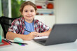 © Volodymyr - Writing homework builds school skills. Writing in notebook supports study. Child writing improves learning focus. Student writing fits home education.