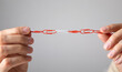 © andranik123 - Man showing red paper clips with one white. Teamwork