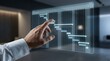 © Ada - Hand interacting with a digital Gantt chart interface for project scheduling and task management in a modern office.