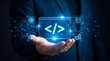 © Rahman - Software development and digital transformation concept with programmer holding a glowing code interface and technology icons