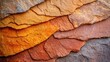 © Igor - Raw terracotta natural stone layers weathered surface texture earthy orange brown mineral streaks geological formation background material for web design backdrop