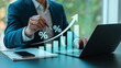 © ROWSHONARA - Professional businessman analyzing financial growth and percentage increase on digital screen