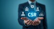 © Nuttamon - Person presents CSR icons on digital interface representing corporate social responsibility sustainability � Business Professional and Corporate Lifestyle Concept for Leadership
