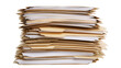 © Elena - Tall stack of manila file folders with documents, isolated on transparent background