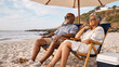 © studioROSSY - Senior Couple Relaxing on Beach Chairs Under Umbrella