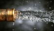 © Selvi - Brass pipe joint spraying a powerful stream of water with droplets against a dark