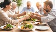 © harryaishi - A multi-generational family enjoys a meal together, toasting with drinks