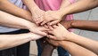 © Sebastian - Diverse hands joined in unity and support, symbolizing teamwork and collaboration.