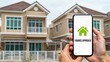 © Zaheer - Smartphone displaying final approval for home loan in front of modern houses