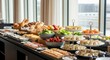 © Ariestia - Luxury Hotel Breakfast Buffet with Fresh Fruits, Assorted Breads, Wraps, and Cold Cuts for Catering Service