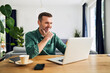 © Westend61 - Mature businessman working from home using laptop