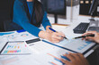 © Sutthicha - Business Consulting meeting working and brainstorming new business project finance investment concept.