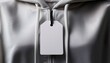 © Hallie - ultra hd blank white label on a soft grey hoodie closeup of a customizable clothing tag with empty space for branding or text image