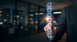 © Galih - Businessman marking a virtual checklist with a red checkmark in a modern office