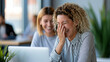 © Nataliya - Two faceless happy businesswomen coworkers friends enjoying work meeting with laughter and fun discussion at office boardroom desk, friendly corporate concept, business