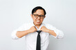 © Munif Rifa'i - Stressed Asian businessman loosening tie in frustration. Tired office worker in white shirt and glasses suffering from burnout. Isolated on white background.