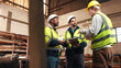 © peopleimages.com - Planning, tablet and men in warehouse for woodwork, manufacturing and contractor team. Furniture, production and carpenter people in joinery factory with tech in workshop for project collaboration