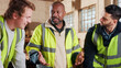© peopleimages.com - Discussion, meeting and men in warehouse for woodwork, manufacturing or contractor team. Furniture, production and carpenter people in joinery factory with chat in workshop, collaboration or project