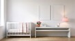 © Turzo Khan - Modern nursery interior with white crib, console table, and blank picture frames