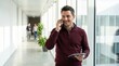 © 형근 최 - Generative AI, Smiling businessman talking on phone holding tablet in modern office corridor