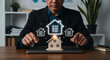 © MdSuhel - Businessman choosing real estate property checklist on virtual screen with home model