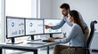 © uimostafa - Business professionals analyzing data on multiple computer screens in office