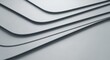 © Khaisan - Gray metallic sheets stacked horizontally with curved edges overlapping