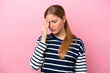 © luismolinero - Young caucasian woman isolated on pink background with headache