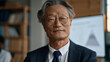 © forenna - Korean gerontologist presenting demographic aging data to a pension fund board, population pyramid projections on screen, formal boardroom, actuarial charts visible, financial