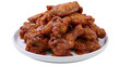 © Vetle - Spicy glazed chicken wings piled on white plate